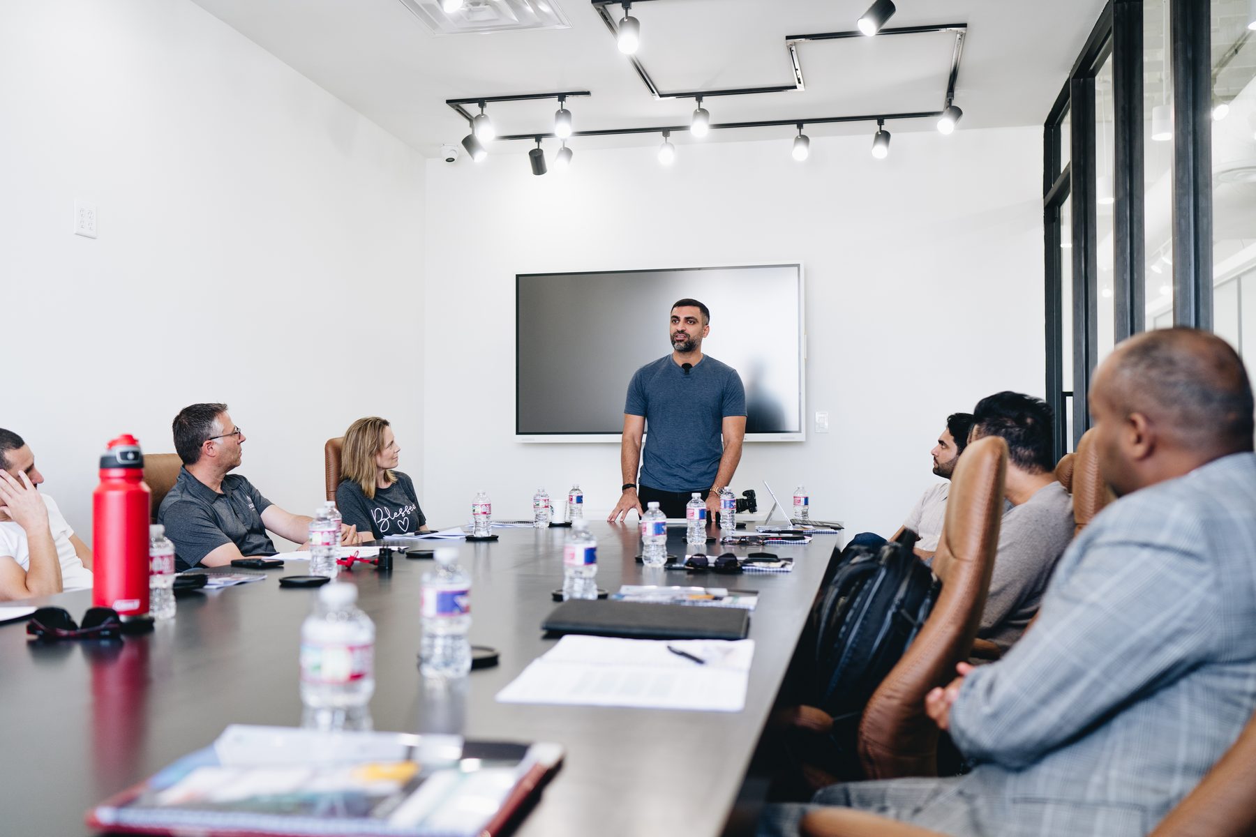 Hamza walking through FlexDeal at a bootcamp session